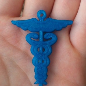 A Caduceus Key Fob, 3D Printed DIY in plastic from the "library" of Thingiverse: Thank You MakerBot and Vin Min.